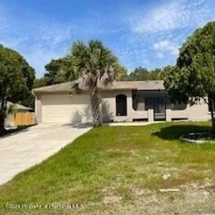 Rent this 3 bed house on 8211 Philatelic Drive in Spring Hill, FL 34606