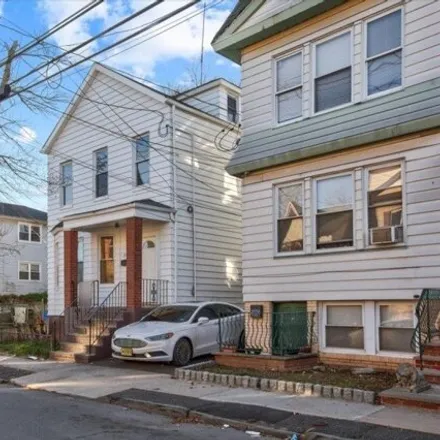 Buy this 5 bed house on 59 Smith Street in Newark, NJ 07106