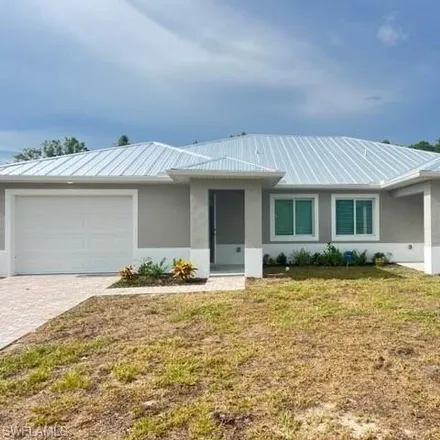 Rent this 3 bed house on 4458 Douglas Lane in Lehigh Acres, FL 33973