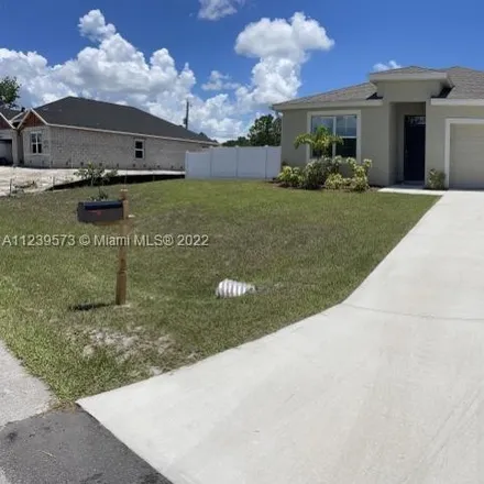 Buy this 4 bed house on 240 Gaspar Street Southwest in Palm Bay, FL 32908