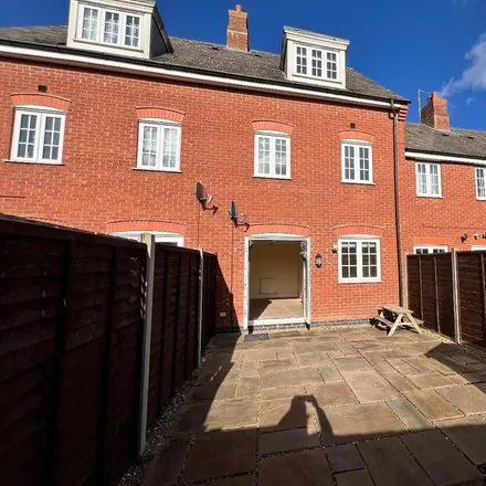 Rent this 4 bed townhouse on Nightingale Drive in Desborough, NN14 2GA