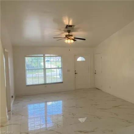 Rent this 3 bed house on 2401 Tena Avenue North in Lehigh Acres, FL 33971