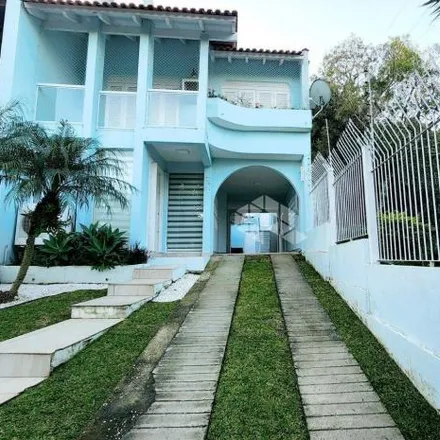 Buy this 3 bed house on Avenida Guaíba 89 in Vila Assunção, Porto Alegre - RS