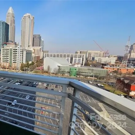 Rent this 3 bed condo on Courtside Condominiums in 505 East 6th Street, Charlotte