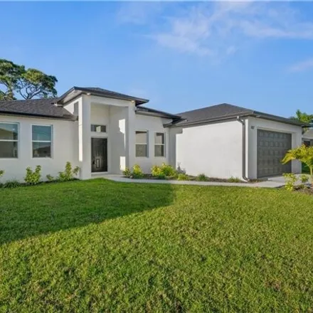 Buy this 4 bed house on 1113 Ne 6th Pl in Cape Coral, Florida