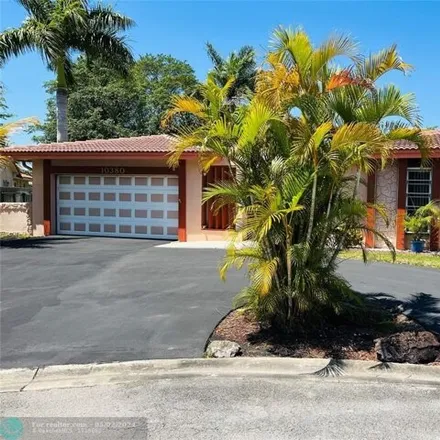Buy this 4 bed house on 10398 Northwest 41st Street in Coral Springs, FL 33065
