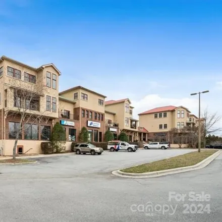 Buy this 1 bed condo on Harpe Aesthetics + Wellness in 475 South Church Street, Willow Bend