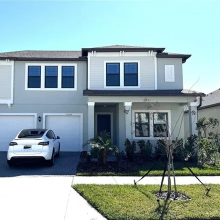 Rent this 5 bed house on Snowy Orchid Terrace in Pasco County, FL 34637