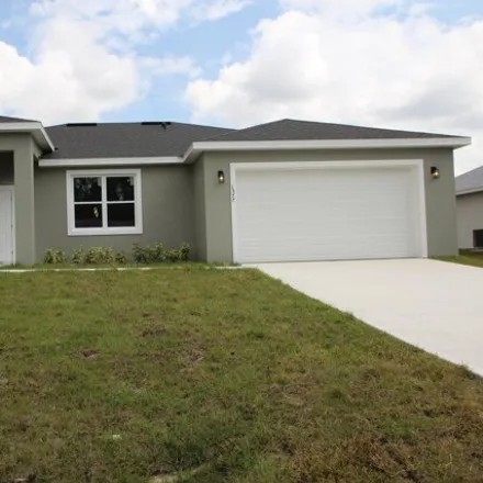 Rent this 4 bed house on 1313 Harper Boulevard Southwest in Palm Bay, FL 32908