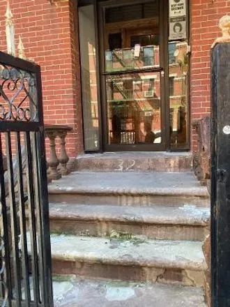 Image 2 - 32 Patchen Avenue, New York, NY 11221, USA - Townhouse for sale