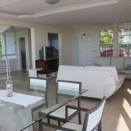 Rent this 4 bed house on Rua Maurílio Lopes da Silva in Praia Brava, Florianópolis - SC