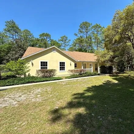 Buy this 3 bed house on 10798 Northwest 68th Terrace in Levy County, FL 32626