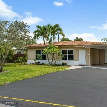 Rent this 3 bed house on 3725 Northeast 16th Terrace in Coral Woods, Oakland Park