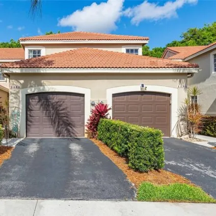 Buy this 3 bed townhouse on 1181 Sorrento Drive in Weston, FL 33326
