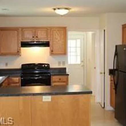 Rent this 3 bed apartment on 3299 Farmridge Court in Greensboro, NC 27410