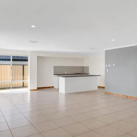 Rent this 4 bed apartment on Bamburgh Turn in Meadow Springs WA 6180, Australia
