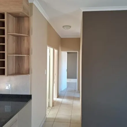 Rent this 3 bed townhouse on Chris Kotze Street in Vorsterpark AH, Midvaal Local Municipality