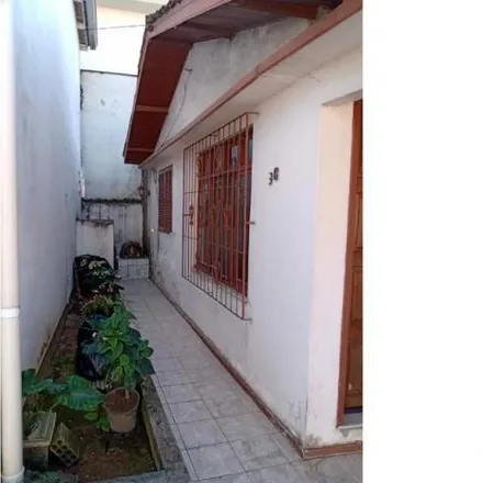 Buy this 3 bed house on Rua Gentil Silveira Sandin in Praia Comprida, São José - SC
