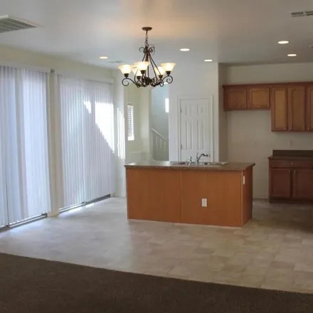 Rent this 5 bed apartment on 14555 West Acapulco Lane in Surprise, AZ 85379