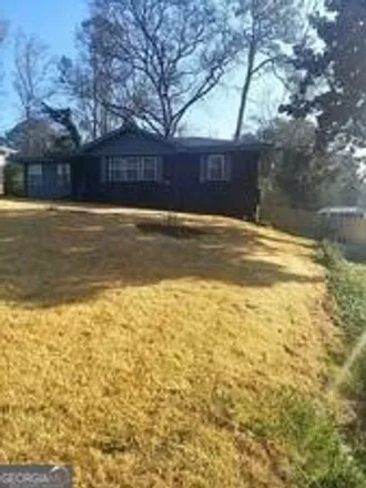 Buy this 3 bed house on 2106 Wildrose Drive in Candler-McAfee, GA 30032