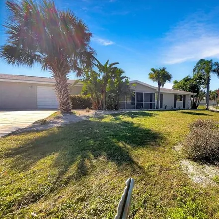 Buy this 4 bed house on 8871 Sydney Avenue in North Port, FL 34287