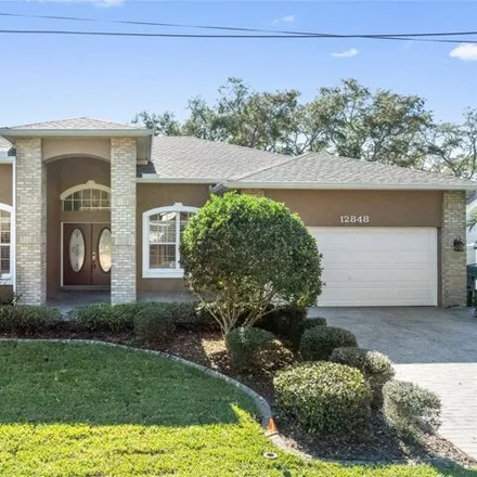 Buy this 3 bed house on Saint John XXIII Fraternity in 7171 Hibiscus Avenue, Pinellas County
