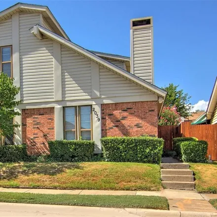Rent this 2 bed townhouse on 2039 Embassy Way in Carrollton, TX 75006