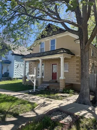 Buy this 4 bed house on 585 West Front Street in Village Square, North Platte