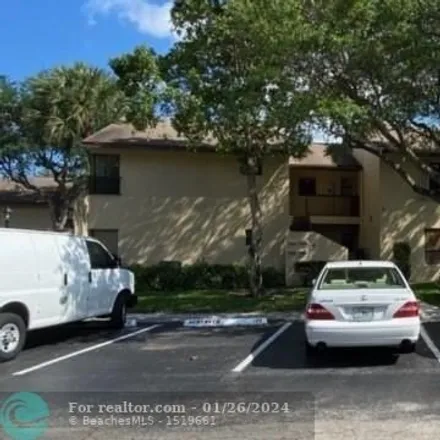 Buy this 3 bed condo on Cocoplum Circle in Coconut Creek, FL