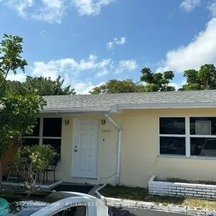 Rent this 2 bed house on 1467 Northeast 56th Street in Imperial Point, Fort Lauderdale