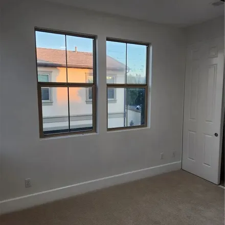 Rent this 4 bed apartment on 151 Desert Bloom in Irvine, CA 92618
