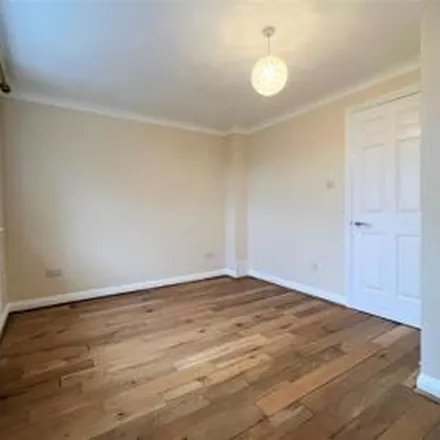 Rent this 4 bed townhouse on Queens Road in Lower Guildford Road, Knaphill