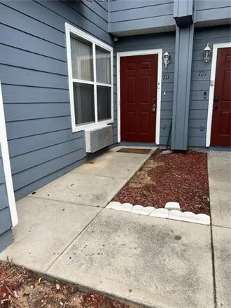 Rent this 3 bed townhouse on 739 Caribbean Drive in Polk County, FL 33897