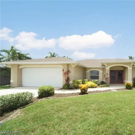 Rent this 3 bed house on 4436 Southwest 14th Avenue in Cape Coral, FL 33914