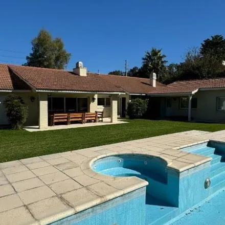 Rent this 5 bed house on unnamed road in Club de Campo San Diego, 1743 Francisco Álvarez
