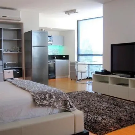 Buy this studio apartment on Camila O´Gorman 435 in Puerto Madero, C1107 CND Buenos Aires