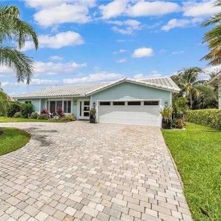 Buy this 3 bed house on 1341 Northeast 27th Way in Country Club Isles, Pompano Beach