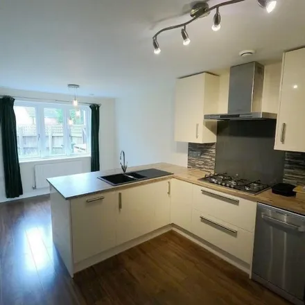 Rent this 4 bed townhouse on Delves Road in West Timperley, WA14 5XJ