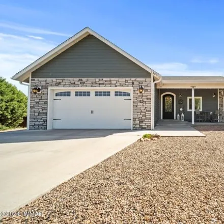 Buy this 4 bed house on 1480 North Hidden Hollow Lane in Show Low, AZ 85901