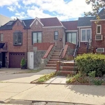 Buy this 2 bed house on 68-12 60th Road in New York, NY 11378