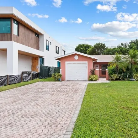 Rent this 4 bed house on 324 Northeast Wave Crest Way in Boca Raton, FL 33432