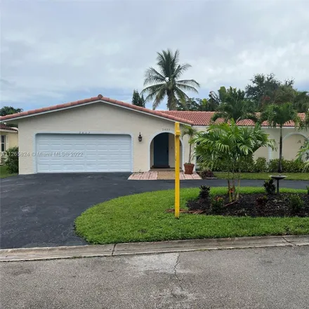 Buy this 4 bed house on 2433 Northwest 118th Terrace in Coral Springs, FL 33065