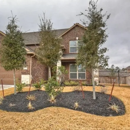 Rent this 4 bed house on 11 Pilot Rock Pl in Tomball, Texas