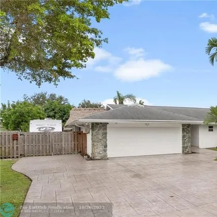 Buy this 4 bed house on 2403 Southwest 85th Terrace in Davie, FL 33324