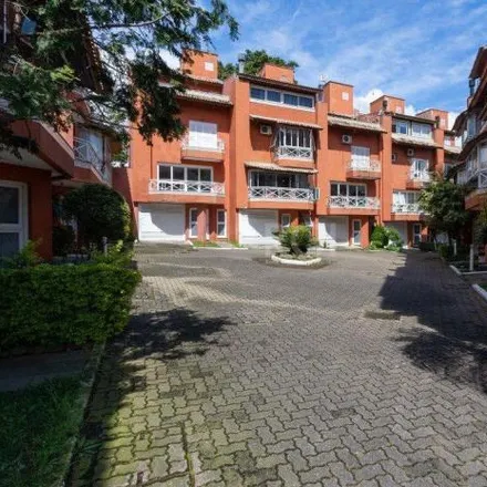 Buy this 4 bed house on Avenida Guaíba 4438 in Vila Assunção, Porto Alegre - RS