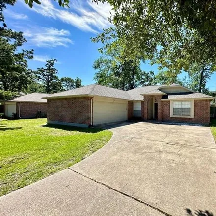 Buy this 4 bed house on 6851 Woodland Oaks Drive in Montgomery County, TX 77354
