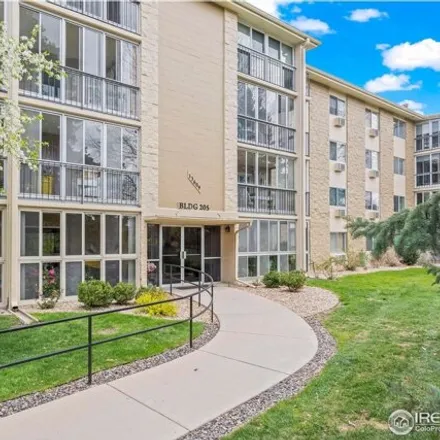 Buy this 2 bed condo on Building 205 in 13609 East Cornell Avenue, Aurora