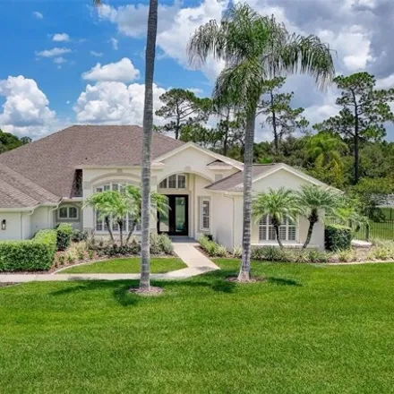 Buy this 4 bed house on 12037 Rambling Oak Blvd in Orlando, Florida