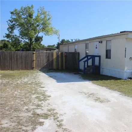 Buy this studio apartment on 16105 Lauderdale Street in Spring Hill, FL 34604