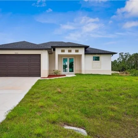Buy this 3 bed house on 2655 24th Street Southwest in Lehigh Acres, FL 33976